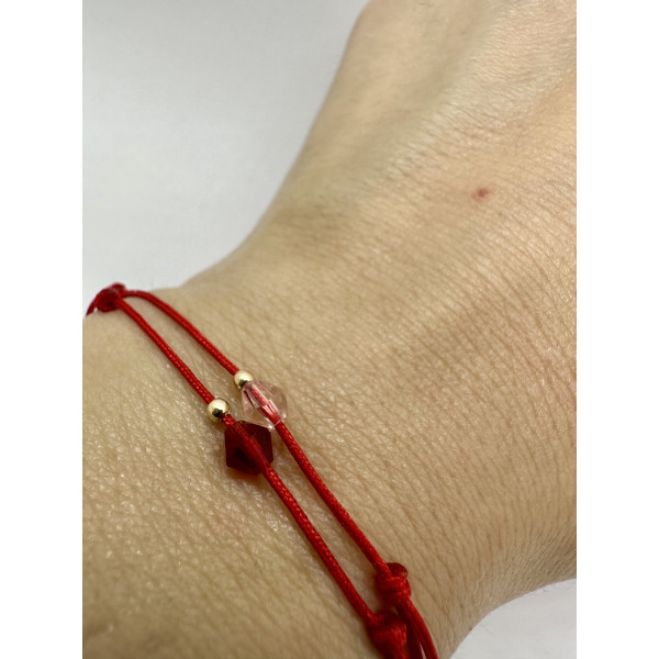 Martisor de aur tip bratara cu bila din aur 14 k cu snur reglabil, dama/copil, aur 14k, snur matase, biluta de aur 14k si cristal rosu/roz, aur galben